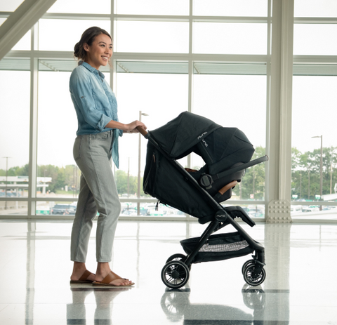 Person - Nuna TRVL Stroller with Travel Bag